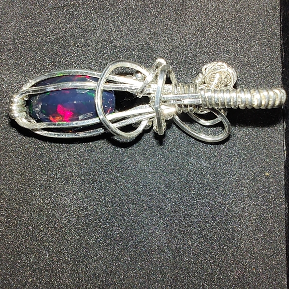 Sterling silver wire wrapped genuine black faceted Ethiopian opal pendant - Picture 5 of 9